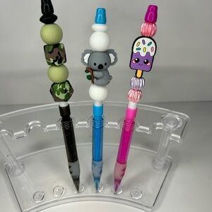 Black and Green Mechanical Pencils with Playful Toppers